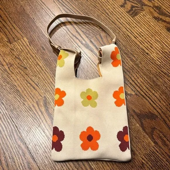 The Lucca Make It Mini Clutch is a knitted bag with a unique unstructured design - Picture 2 of 3